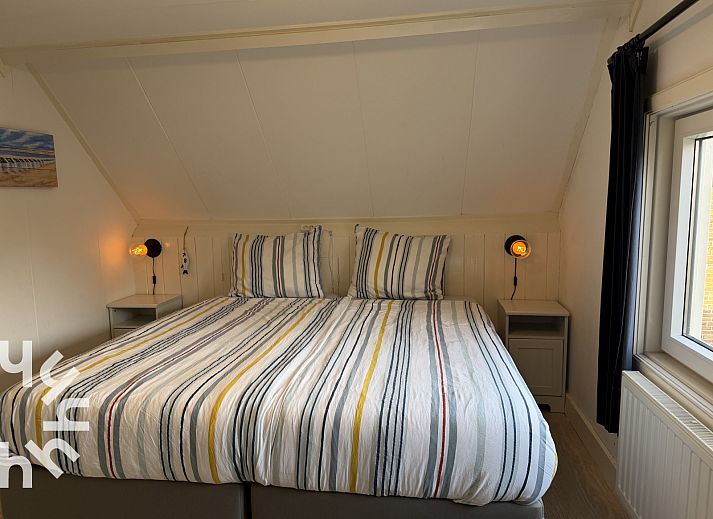 Vacation home ZE1541 in Zoutelande, Walcheren, Zeeland with charming facade and inviting terrace for a relaxing stay.