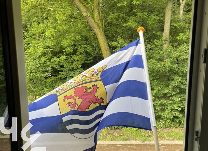 Vacation home ZE1541 in Zoutelande, Walcheren, Zeeland with charming brick facade and attractive terrace, ideal for a relaxing stay.