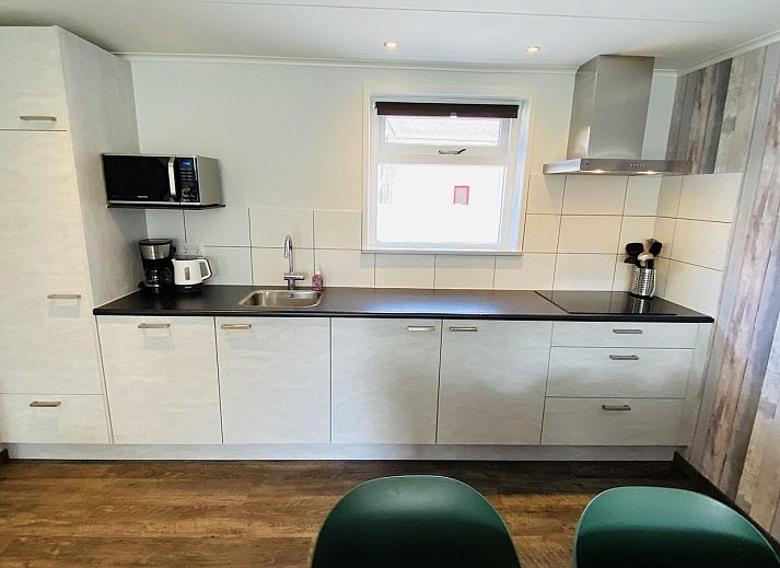 Gezellige woonkamer van VZ110 Vakantiehuis Zoutelande, Walcheren, Zeeland.