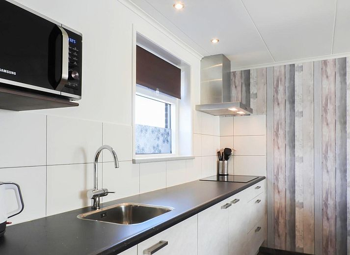 Gezellige woonkamer van VZ110 Vakantiehuis Zoutelande, Walcheren, Zeeland.