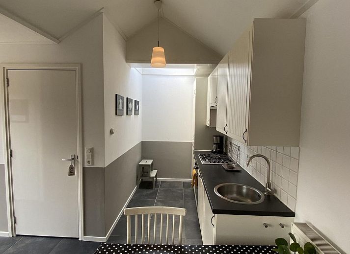 Innenbereich von VZ238 Vakantiewoning Zoutelande mit gemuetlicher Sitzecke in Zoutelande, Walcheren, Zeeland.