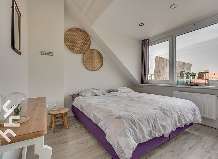 Terras van vakantiehuis ZE679 in Zoutelande, Walcheren, met zitje en uitzicht op de omgeving.