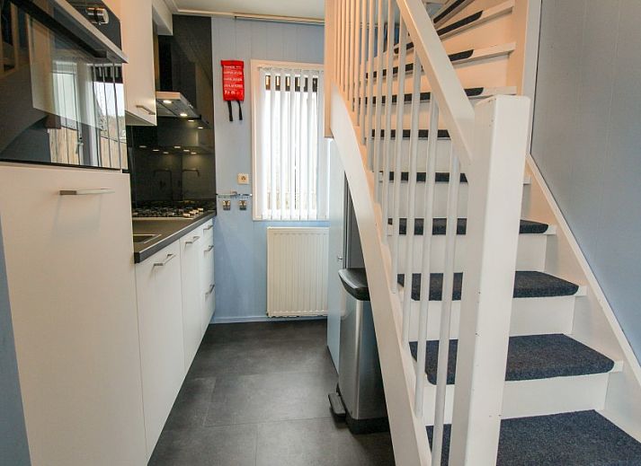 Cozy living room in Sealife - Zoutelande vacation home with dining area and lots of light.