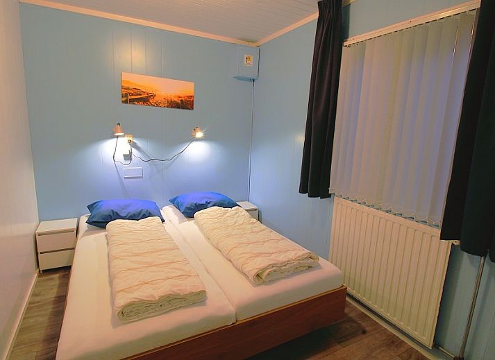 Entrance of vacation home Sealife - Zoutelande surrounded by green nature in Walcheren.