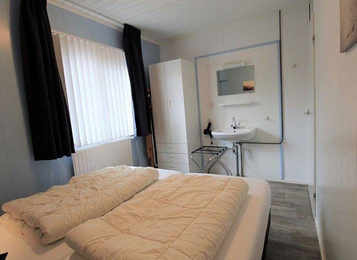 Entrance of vacation home Sealife - Zoutelande surrounded by green nature in Walcheren.