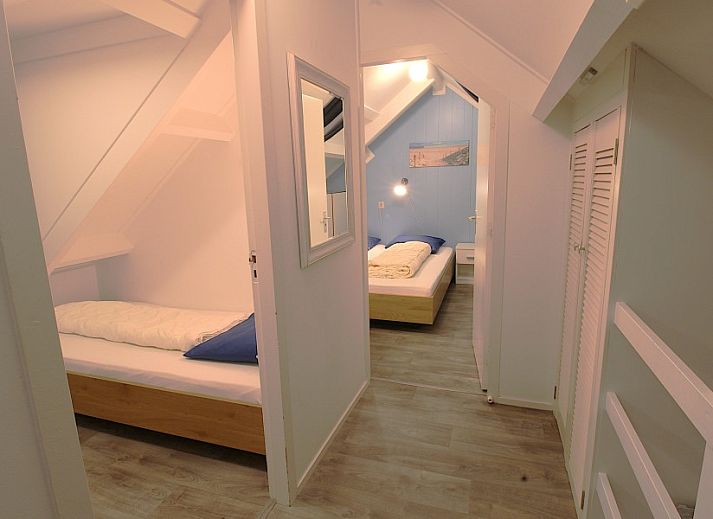 Entrance of vacation home Sealife - Zoutelande surrounded by green nature in Walcheren.