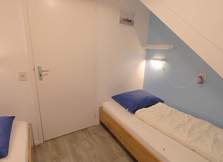 Entrance of vacation home Sealife - Zoutelande surrounded by green nature in Walcheren.