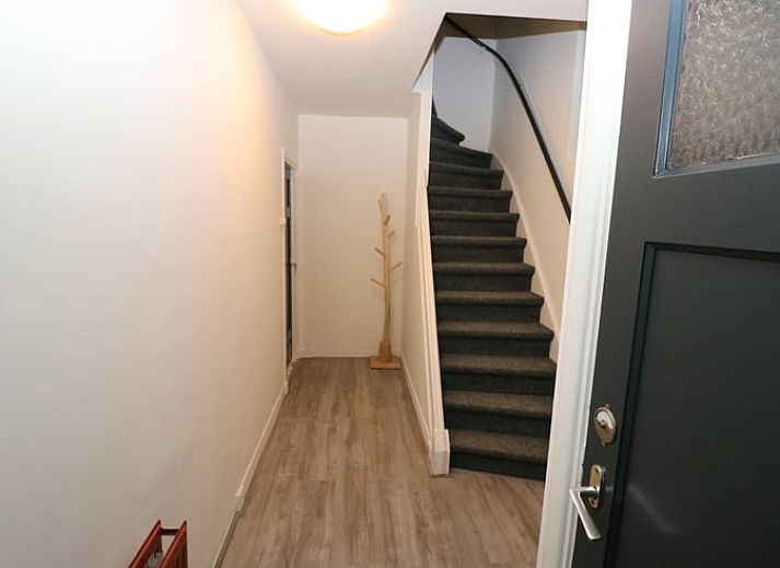 Vakantiehuis in Arnemuiden verscholen tussen bomen op Walcheren, Zeeland.