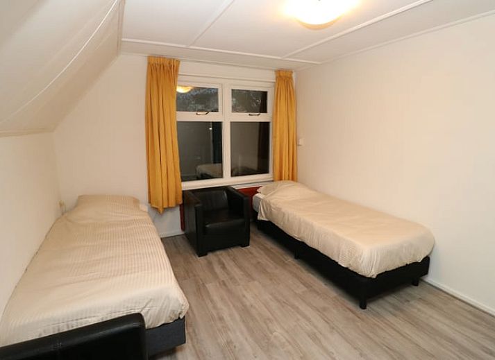 Buitenterras met barbecue bij Vakantiehuis in Arnemuiden, ideaal voor buitenleven in Walcheren, Zeeland.