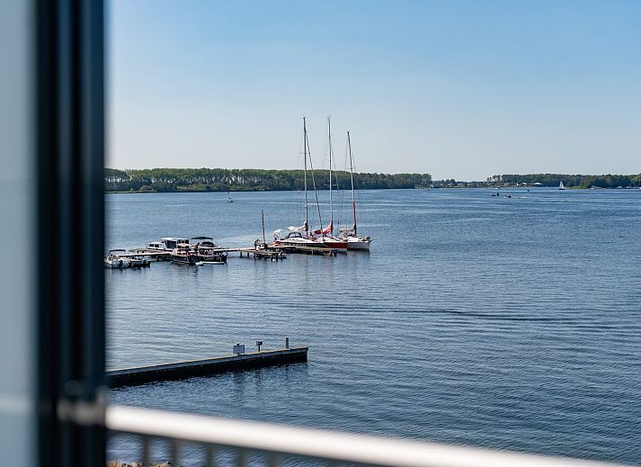 Stylish sitting area with comfortable sofa in Lamsoor 91 | Veerse Wende, vacation home in Arnemuiden, Walcheren.