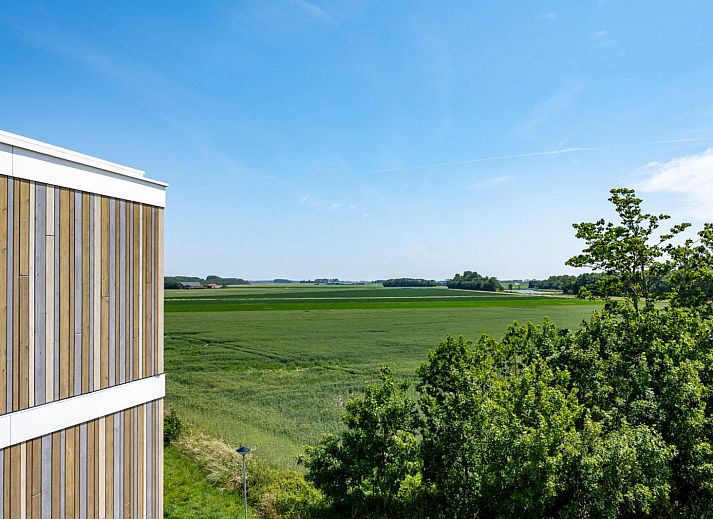 Stylish sitting area with comfortable sofa in Lamsoor 91 | Veerse Wende, vacation home in Arnemuiden, Walcheren.
