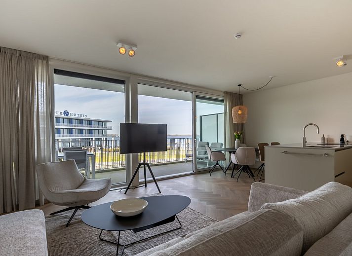 Luxury living room in Lamsoor 47 | Veerse Wende, vacation home in Arnemuiden, Walcheren, Zeeland overlooking water.