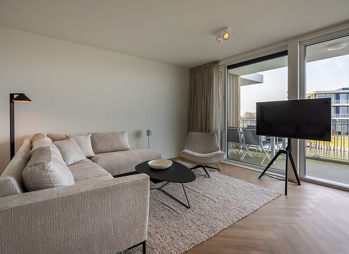 Luxury living room in Lamsoor 47 | Veerse Wende, vacation home in Arnemuiden, Walcheren, Zeeland overlooking water.