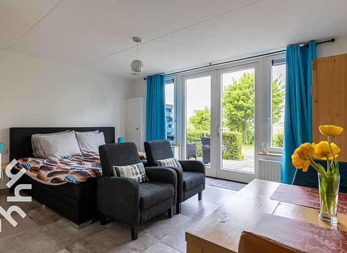 Private Terrasse des Ferienhauses ZE583 in Vrouwenpolder, Walcheren, ideal fuer Mahlzeiten im Freien an der frischen Luft Zeelands.