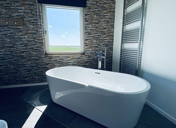 Aussenbereich mit Gartenmoebeln im VZ587 Ferienhaus Vrouwenpolder, Walcheren.