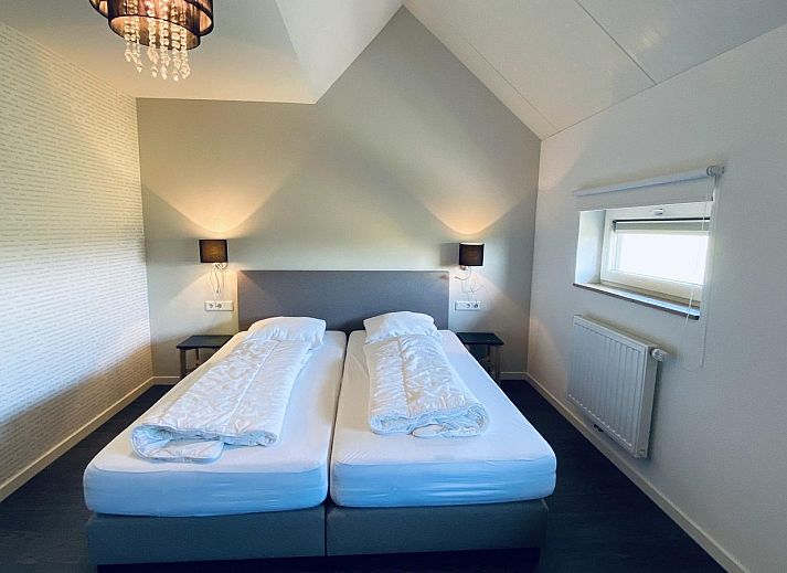 Terras met uitzicht op tuin bij VZ740 Vakantiewoning Vrouwenpolder, Zeeland.