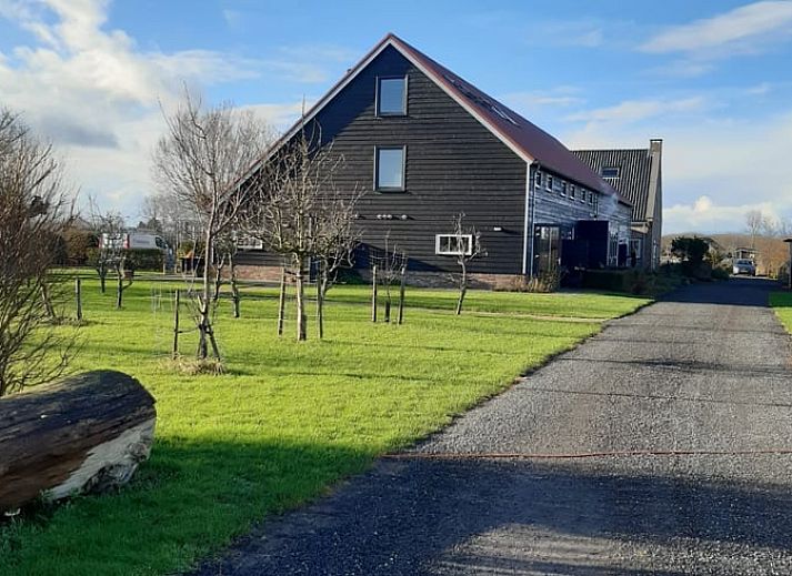 Attractive bedroom in Holiday Home in Vrouwenpolder, Walcheren, Zeeland with elegant interior.