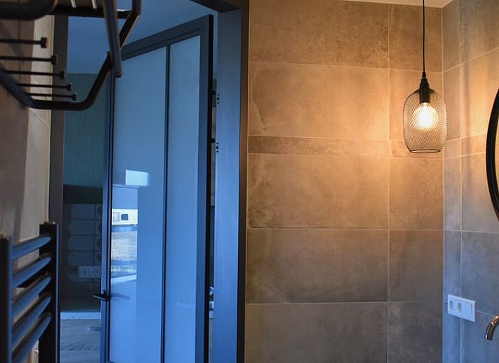 Attractive bedroom in Holiday Home in Vrouwenpolder, Walcheren, Zeeland with elegant interior.