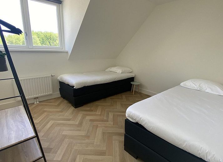 Cozy living room of VZ1021 Vakantiewoning in Veere with modern furnishings, Veere, Walcheren, Zeeland.