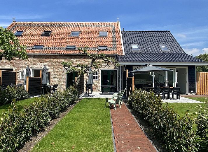 Exterior of VZ1022 Holiday apartment in Veere, Walcheren, Zeeland with an inviting terrace.