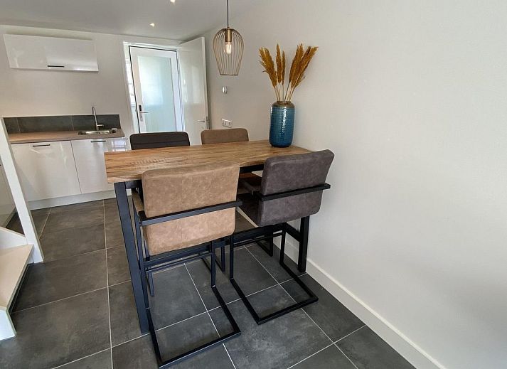 Cozy terrace of VZ1022 Holiday apartment in Veere, Walcheren, Zeeland overlooking the garden.