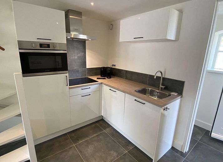 Cozy terrace of VZ1022 Holiday apartment in Veere, Walcheren, Zeeland overlooking the garden.