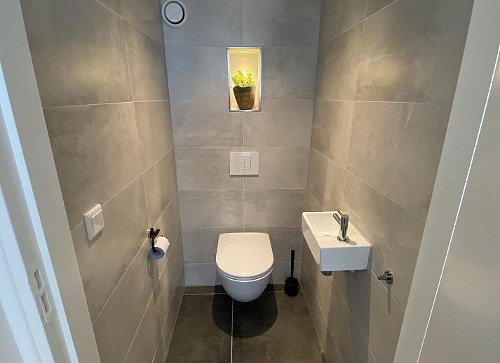 Rustic exterior of VZ1022 Holiday apartment in Veere, Walcheren, Zeeland with sunny terrace.