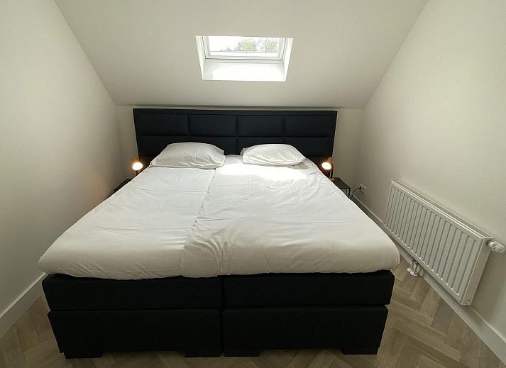 Rustic exterior of VZ1022 Holiday apartment in Veere, Walcheren, Zeeland with sunny terrace.