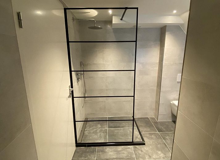 Rustic exterior of VZ1022 Holiday apartment in Veere, Walcheren, Zeeland with sunny terrace.