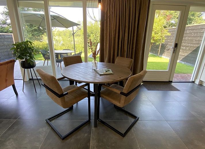 Relax on the sun loungers in the garden of VZ1064 Luxury vacation apartment in Veere, Walcheren, Zeeland.