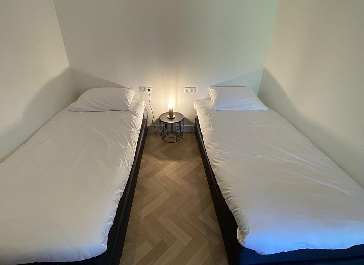 Spacious garden with shaded areas at VZ1064 Luxury vacation apartment in Veere, Walcheren, Zeeland.