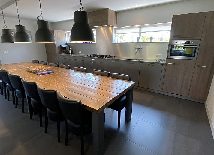 Sunny terrace at VZ1001 Group accommodation in Serooskerke, Walcheren, Zeeland.