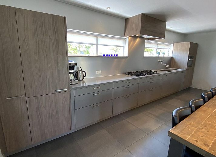 Sunny terrace at VZ1001 Group accommodation in Serooskerke, Walcheren, Zeeland.