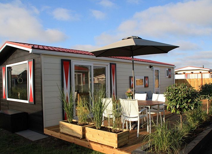 Enjoy the sun on the terrace of VZ824 Chalet in Veere, Serooskerke, Walcheren, Zeeland.