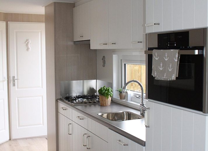 Enjoy the sun on the terrace of VZ824 Chalet in Veere, Serooskerke, Walcheren, Zeeland.