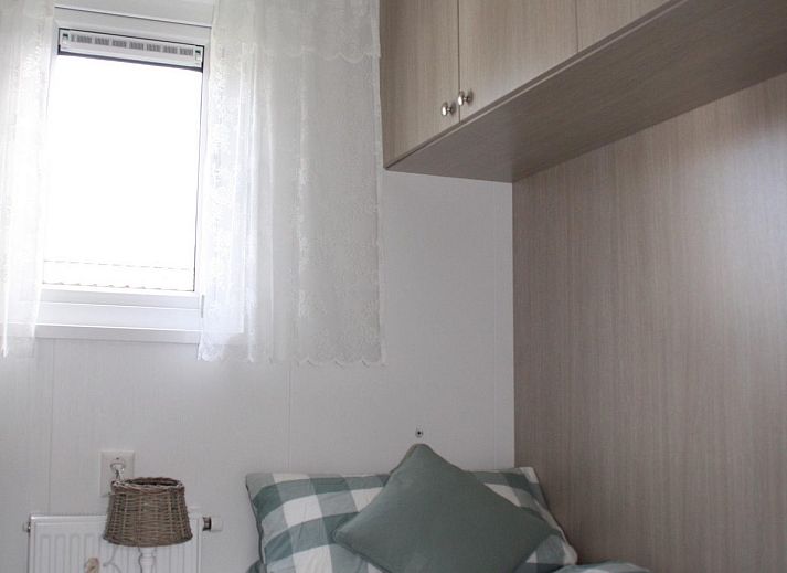 Lounge area on the veranda of VZ824 Chalet in Veere, Serooskerke, Walcheren, ideal for relaxation.