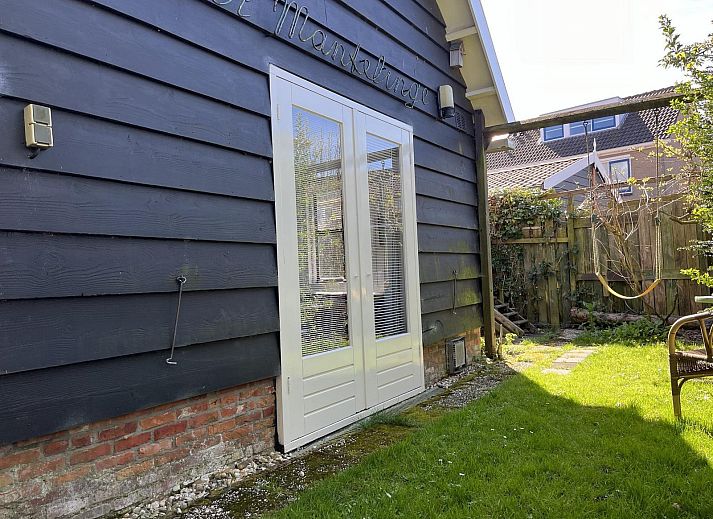 Cozy terrace at VZ2412 Vakantiewoning Serooskerke, a vacation home in Walcheren, Zeeland.