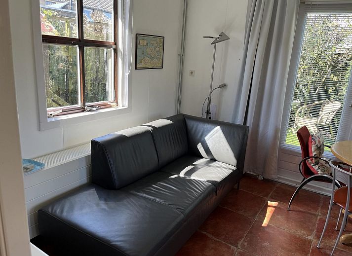 Rustic facade of VZ2412 Holiday home Serooskerke, located in green Walcheren, Zeeland.