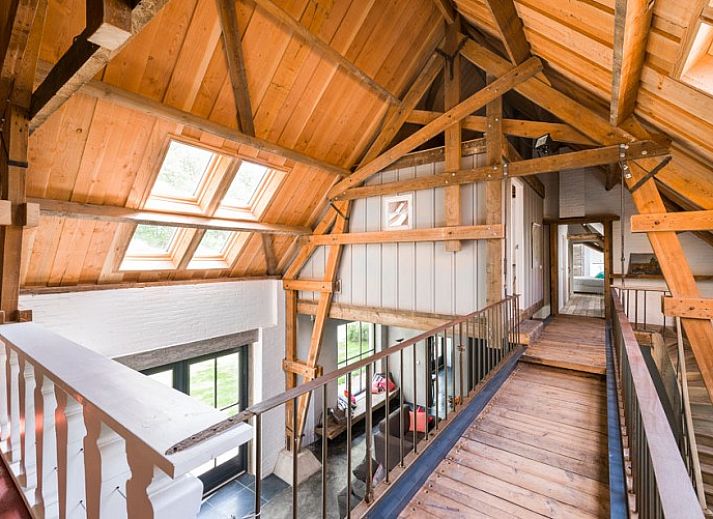 Cozy terrace at Mariekerke vacation home in Meliskerke, Walcheren, with ample seating and green surroundings.