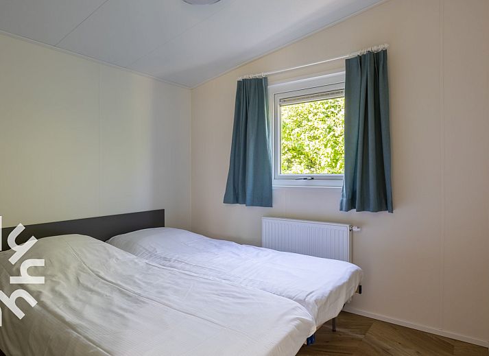 Twee vakantiehuizen ZE1265 in Meliskerke, Walcheren met grasveld.