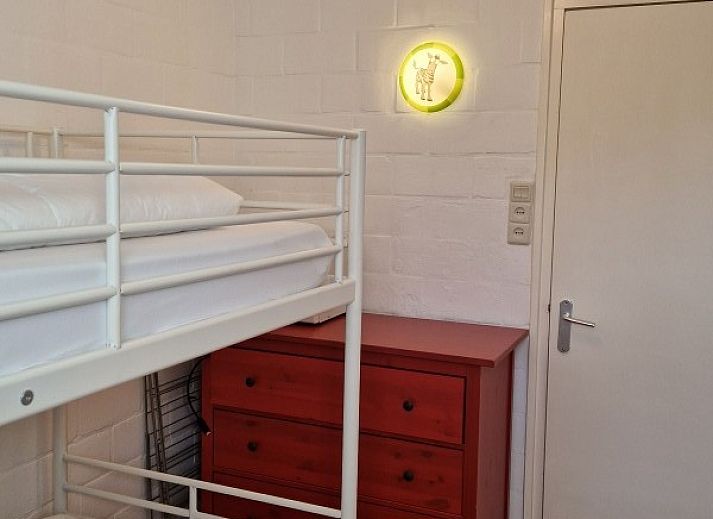 Dining and sitting area in Holiday home Meidoorn, Meliskerke, Walcheren. Spacious interior space with lots of natural light.