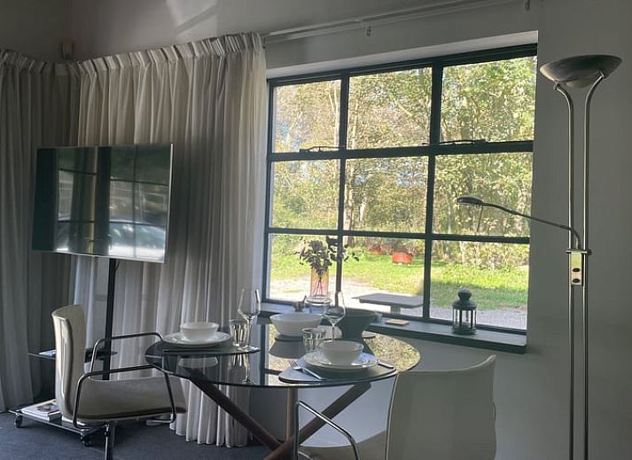 Luchtfoto van Vakantiehuisje in Biggekerke, omgeven door duinen en uitzicht op de zee in Walcheren, Zeeland.