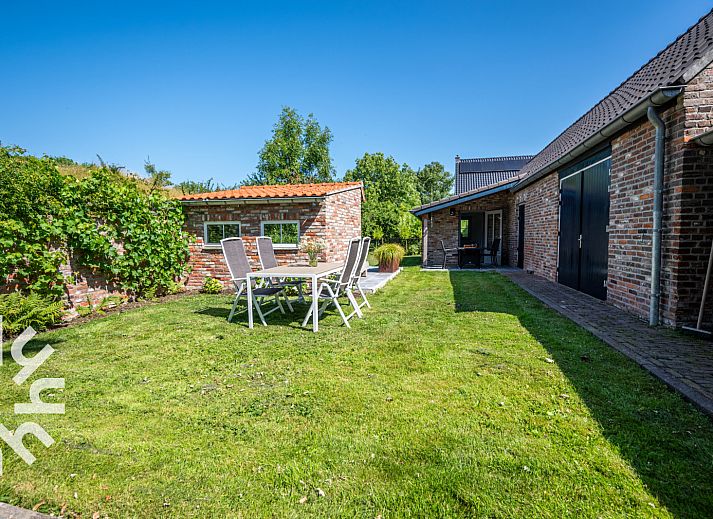 Eethoek en woonkamer in vakantiehuis ZE1175, Biggekerke, Walcheren, Zeeland.