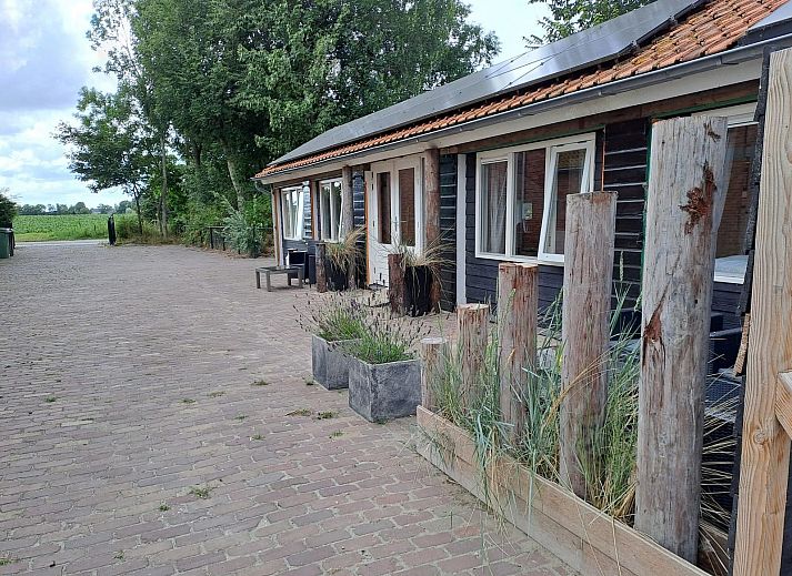 Esstisch im Wohnzimmer von VZ494 Ferienhaus Grijpskerke, Walcheren, Zeeland.