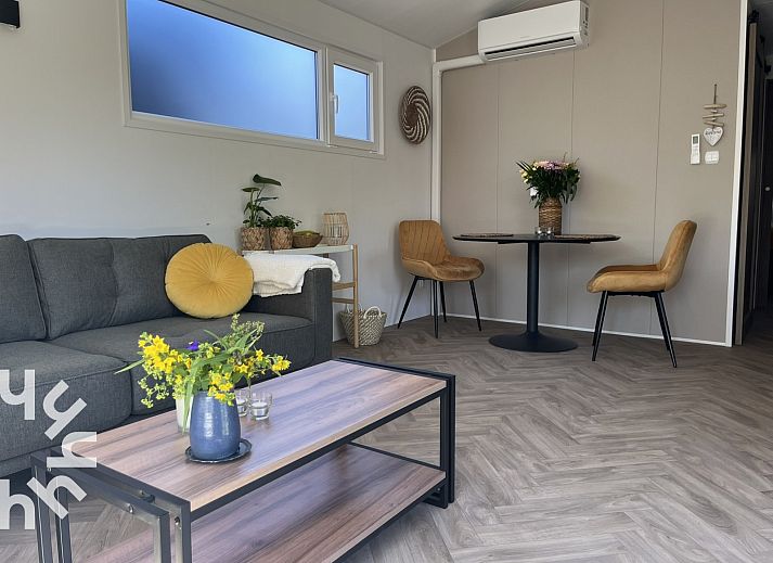 Relax on the comfortable lounge set at ZE1415 in Gapinge, Walcheren, Zeeland.