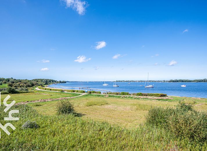 Stylish living room in vacation home ZE1415, Gapinge, Walcheren, Zeeland.