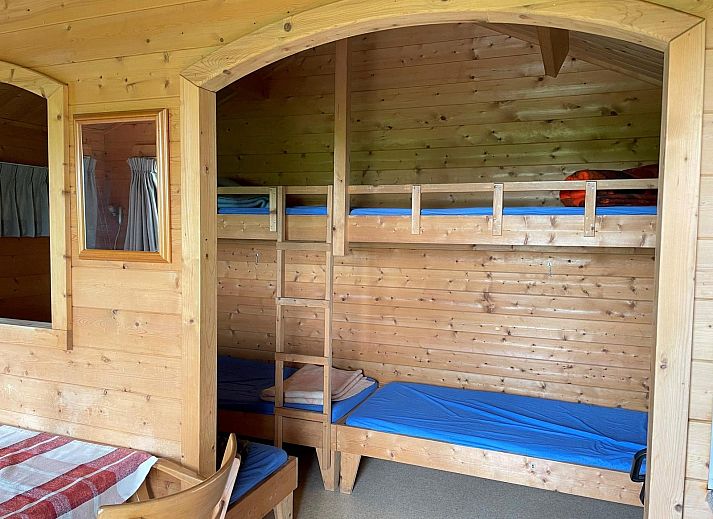 Veranda des Ferienhauses VZ2319 Natur in Koudekerke-Dishoek mit Blick auf die gruene Umgebung in Walcheren, Zeeland.