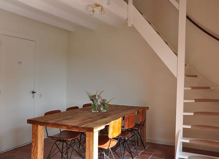 Boomgaard met jonge bomen bij Vakantiehuis in Nieuw- en Sint Joosland, Walcheren, Zeeland, perfect voor natuurwandelingen.