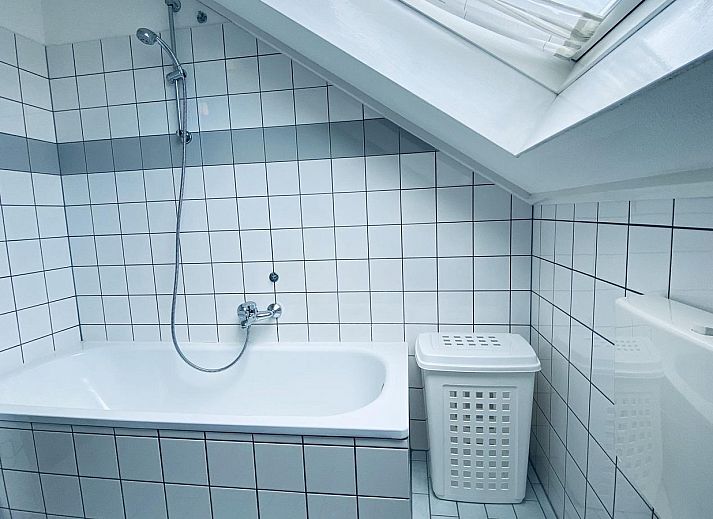 Die gemuetliche Terrasse von VZ407 Ferienhaus Breskens ist ideal fuer Mahlzeiten im Freien in Zeeuws-Vlaanderen.