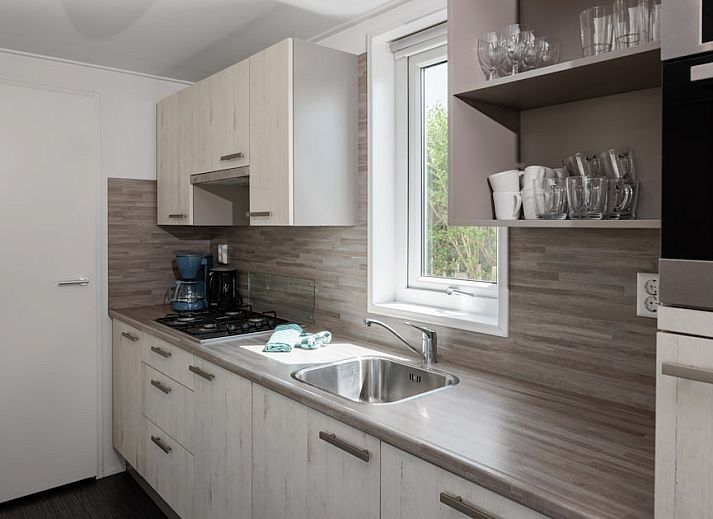 Lodge 6C in Breskens, Zeeuws-Vlaanderen, offers a modern vacation home with sunny terrace and comfortable outdoor space in Zeeland.